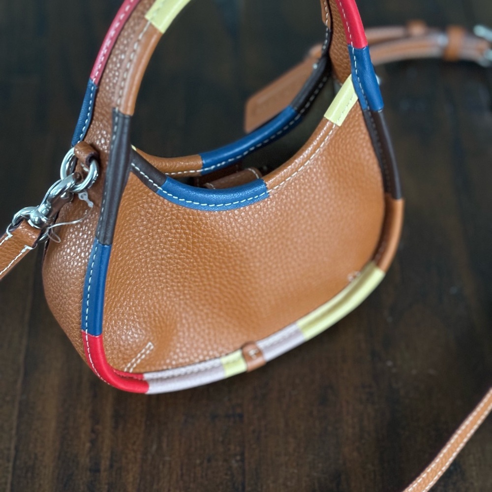 Leather Mini Ergo bag in Coachtopia